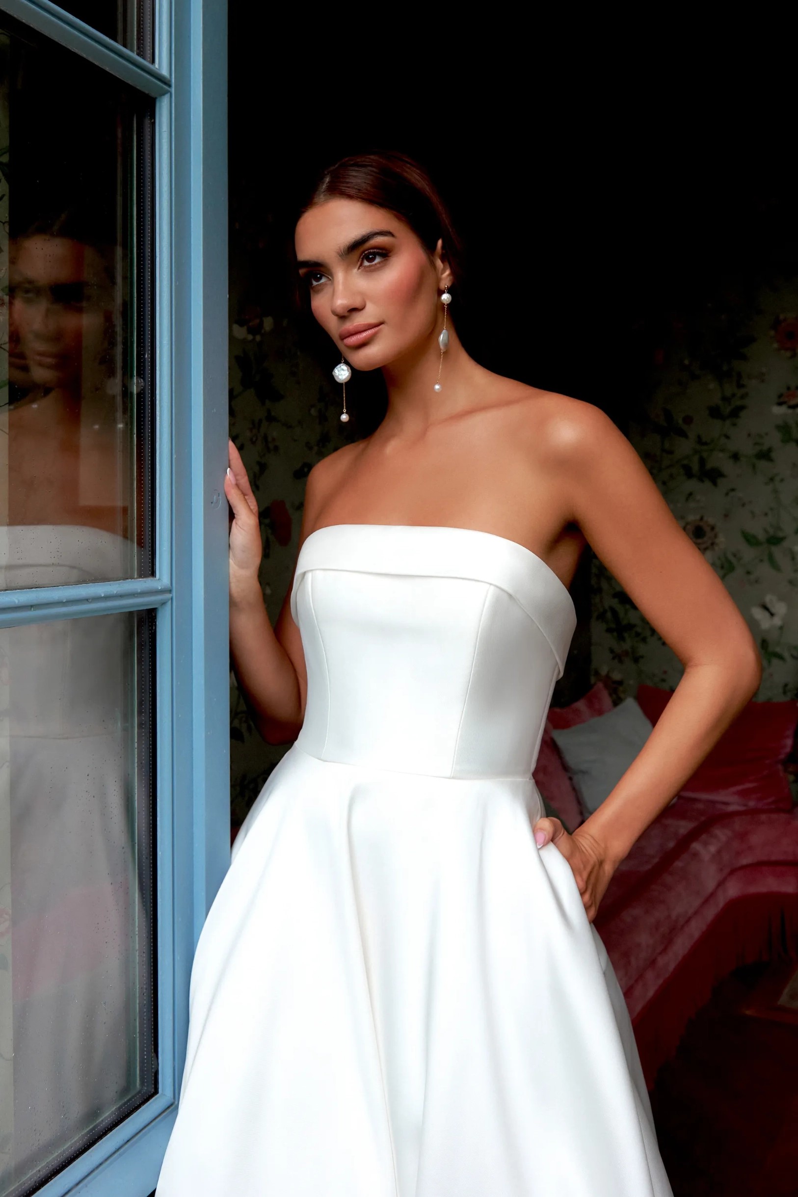 Model wearing white Sincerity Bridal by Justin Alexander dress